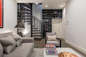 Basement Living area with spiral stair